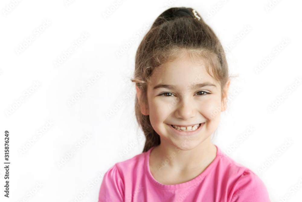 Portrait of happy smiling child girl isolated on white background. Laughing people. Positive emotions. Portrait of happy smiling child girl isolated on white background. Laughing people. Positive emotions.