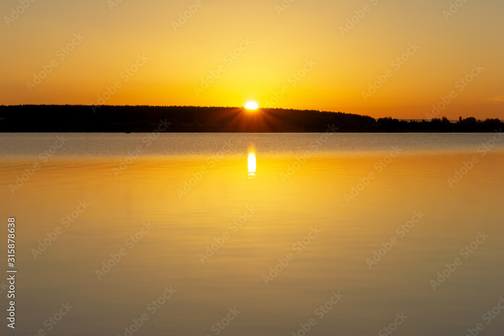 Beautiful view for sunrise over calm water of river. Morning landscape.