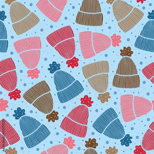 Vector winter hat pattern in blue and red. Simple doodle beanie and snow made into repeat. Great for background, wallpaper, wrapping paper, packaging, fashion.
