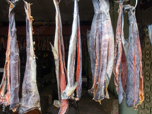 Traditional air dried salmon hung up for sale in Hokkaido, Japan