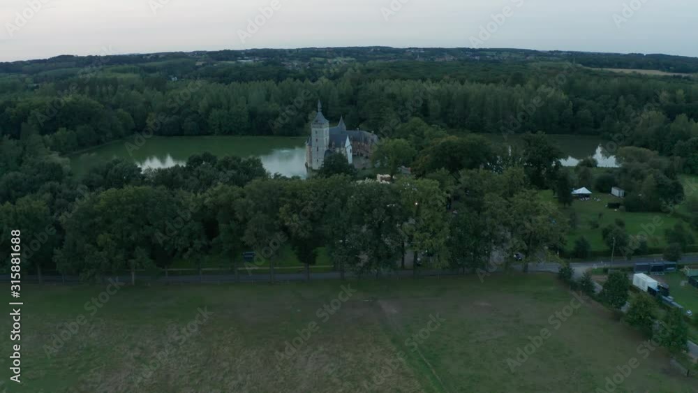 Aerial of old Castle and pond in the woods, Kasteel van horst flanders, Belgium Aerial of old Castle and pond in the woods, Kasteel van horst flanders, Belgium