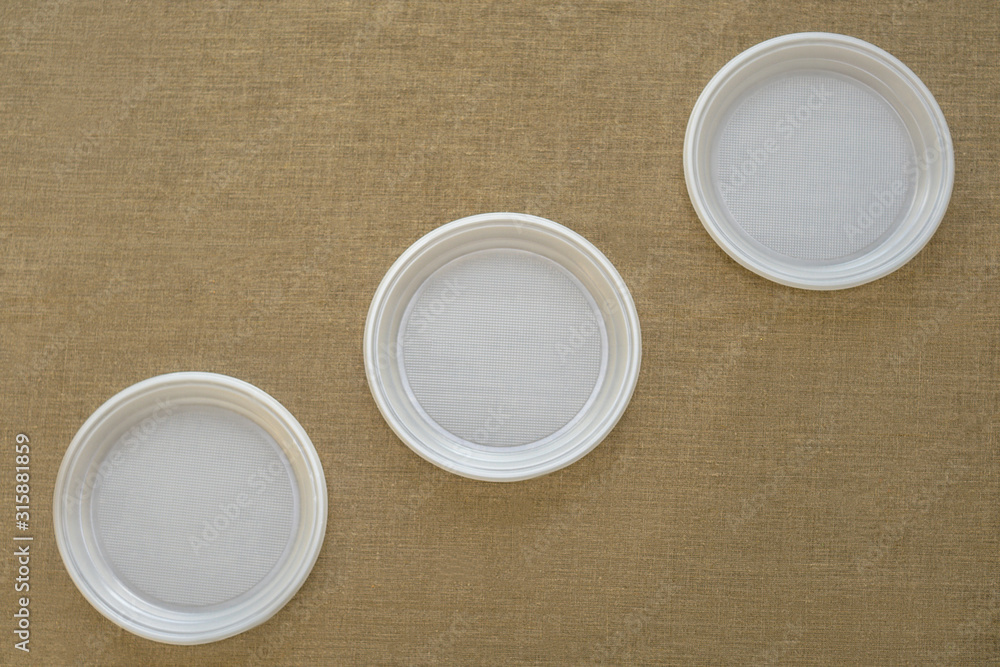 Three plastic plate on canvas. Three plastic plate on canvas.