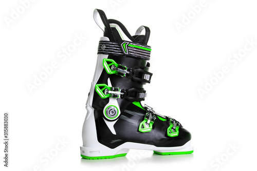 Profesional Green ski boots isolated on white background