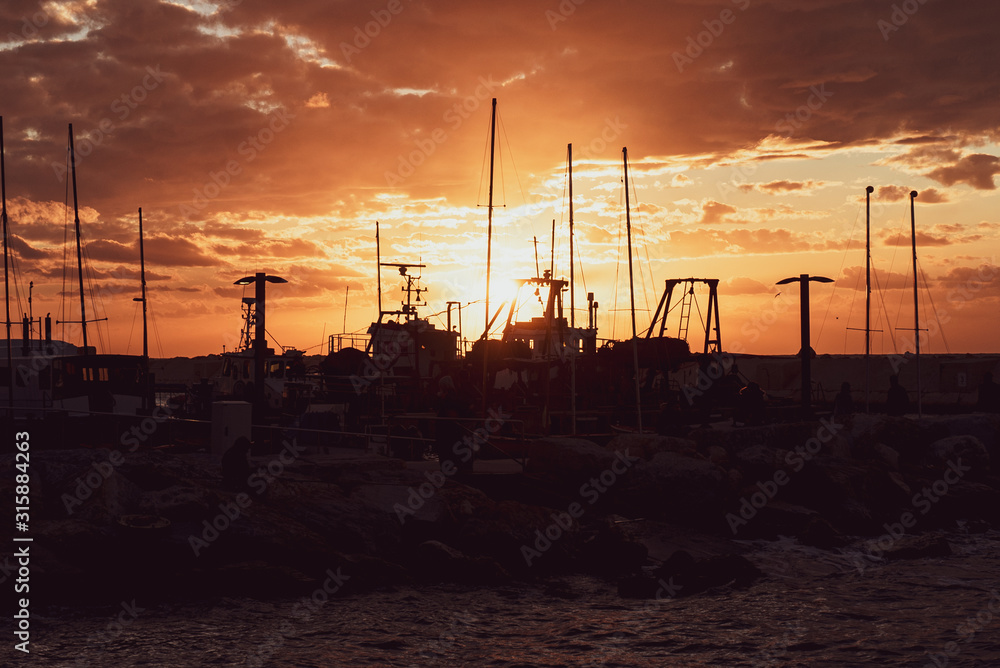 Yachts on the sunset at the Jaffa Port in Tel Aviv