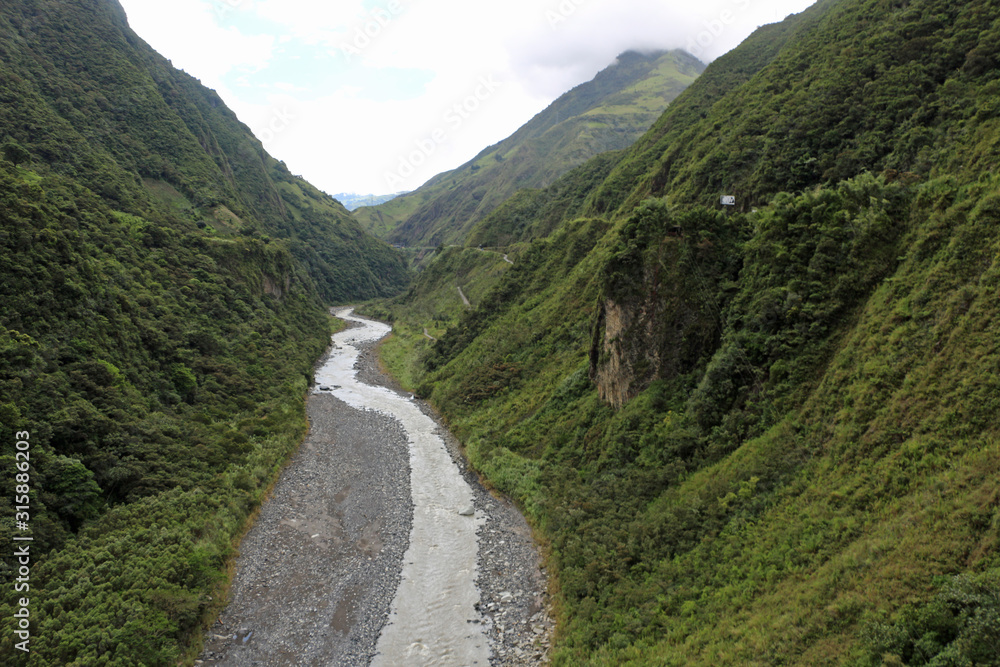 View from the cable car into a canyon near Banos Ecuador View from the cable car into a canyon near Banos Ecuador