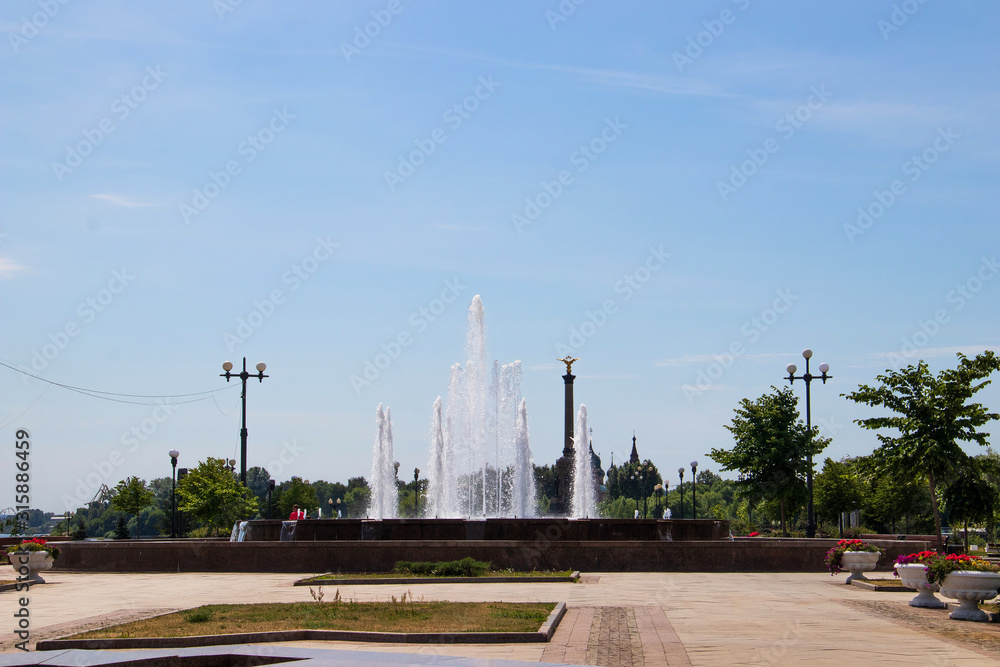 Yaroslavl. Park on Arrow. Fountain jets in the sun Yaroslavl. Park on Arrow. Fountain jets in the sun