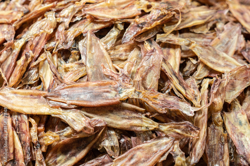 Dried squid are sold at the fresh market. Dried squid are sold at the fresh market.