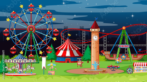 Scene with many circus rides in the park at night