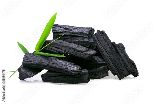 Natural wood charcoal isolated on white background