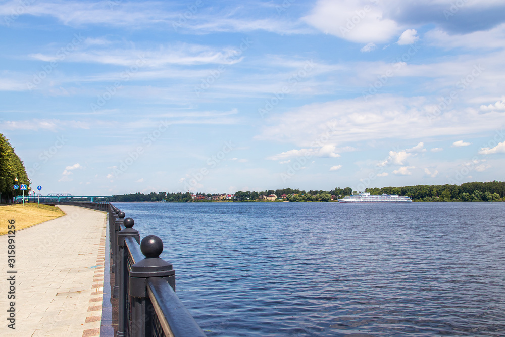 Fototapeta premium Bright summer day in the Strelka of Yaroslavl Beautiful landscaping of the Park on the embankment of the Volga and Kotorosl in Yaroslavl