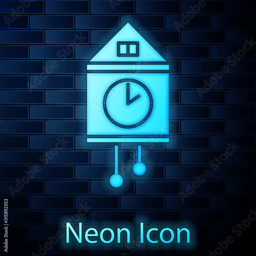 Glowing neon Retro wall watch icon isolated on brick wall background. Cuckoo clock sign. Antique pendulum clock. Vector Illustration
