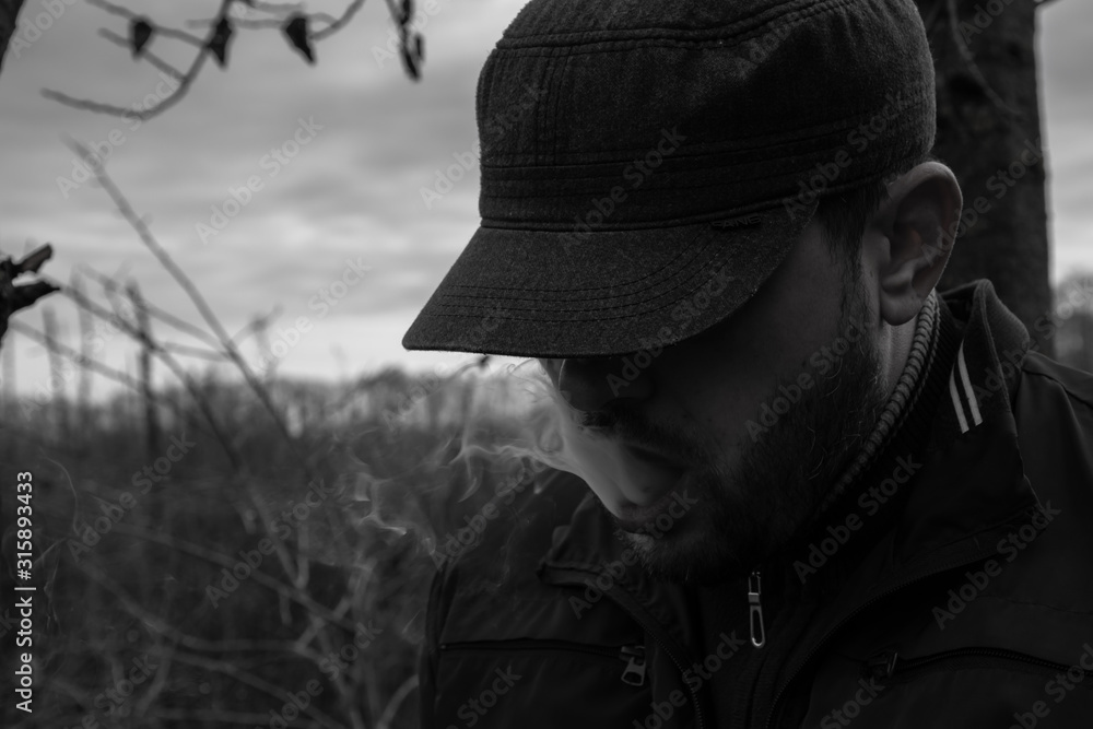 Fototapeta premium man in noir hat