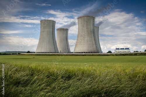 Cooling towers of nuclear power plant, summer day with cloudy sky, Dukovany, Czech Republic