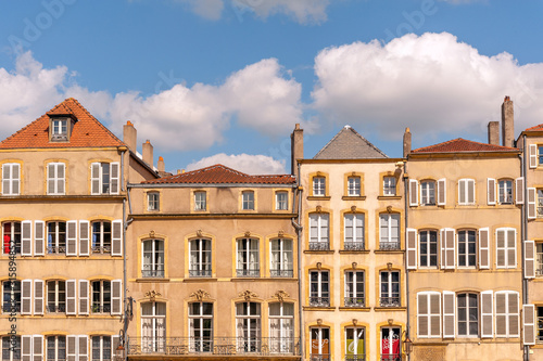 Typical old houses with chimneys along Place de Chambre town square in Metz, France