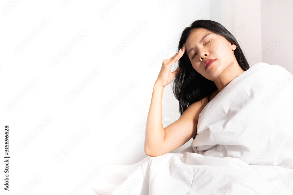 Woman with headache with blank on the left Woman with headache with blank on the left