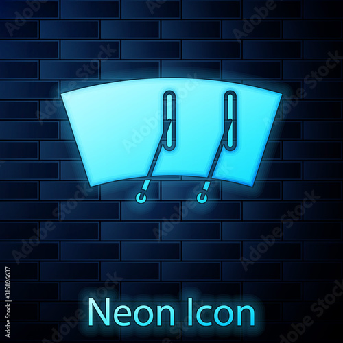 Glowing neon Windscreen wiper icon isolated on brick wall background. Vector Illustration