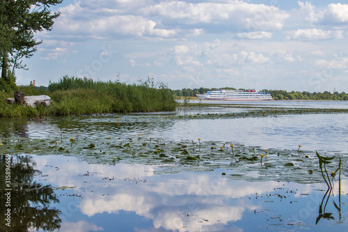 Bright summer day in the Strelka of Yaroslavl Beautiful landscaping of the Park on the embankment of the Volga and Kotorosl in Yaroslavl