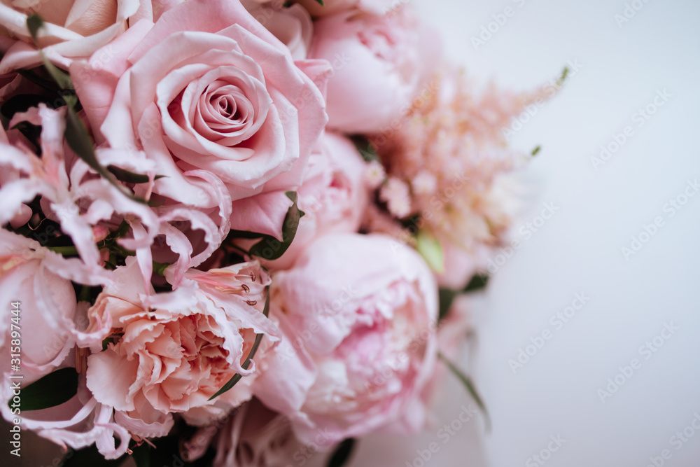 Fluffy pink peonies flowers background copy space