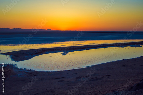 Fototapeta Naklejka Na Ścianę i Meble -  Sunrise Chott el Djerid — the salty desert in Tunisia, Africa