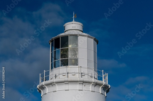 Close up of the light section of a lighthouse