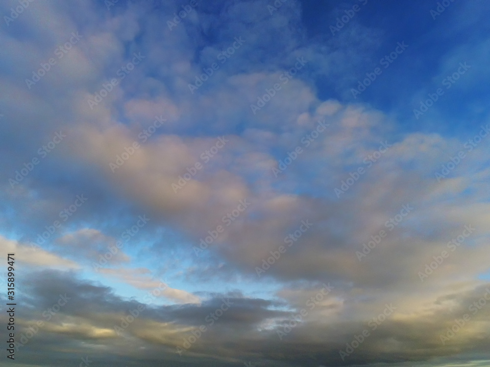 Blue sky with clouds abstract nature background.