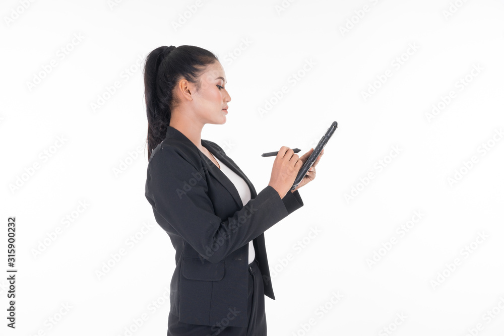 An attractive woman wearing business attire holding a tablet with various poses isolated on white background. Suitable for image cut out and manipulation works for technology,business or finance theme An attractive woman wearing business attire holding a tablet with various poses isolated on white background. Suitable for image cut out and manipulation works for technology,business or finance theme