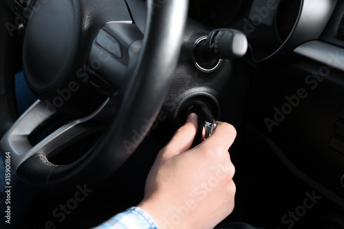 Photos driver turns on engine ignition key