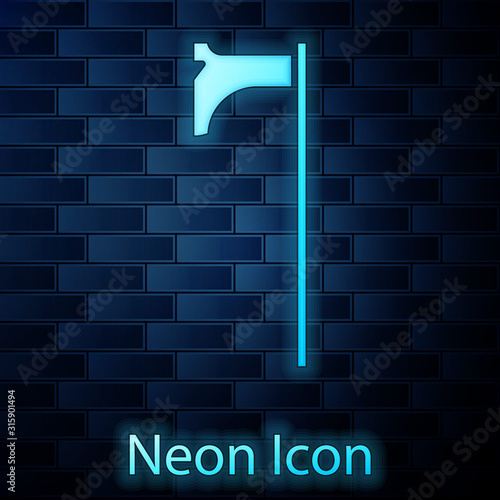 Glowing neon Medieval axe icon isolated on brick wall background. Battle axe, executioner axe. Medieval weapon. Vector Illustration