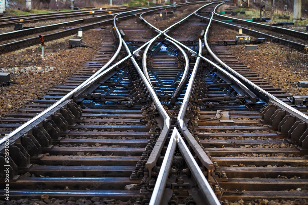 Rails, track, railway on dark day, close-ups