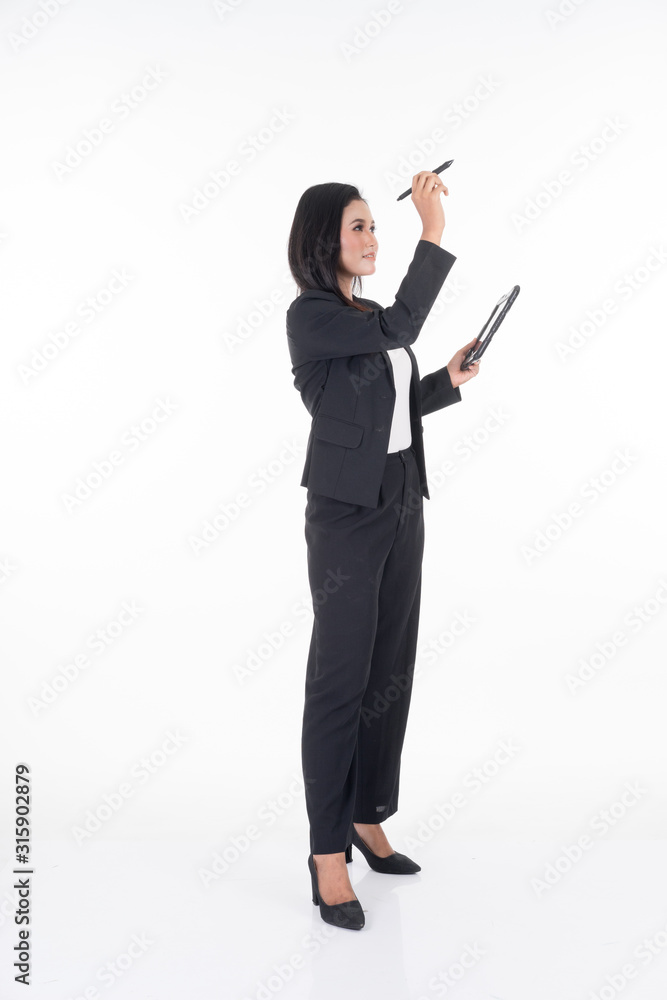 An attractive woman wearing business attire holding a tablet with various poses isolated on white background. Suitable for image cut out and manipulation works for technology,business or finance theme