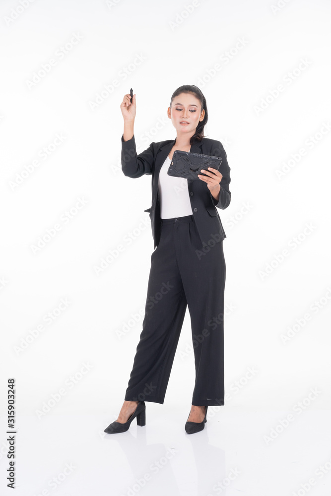 An attractive woman wearing business attire holding a tablet with various poses isolated on white background. Suitable for image cut out and manipulation works for technology,business or finance theme An attractive woman wearing business attire holding a tablet with various poses isolated on white background. Suitable for image cut out and manipulation works for technology,business or finance theme