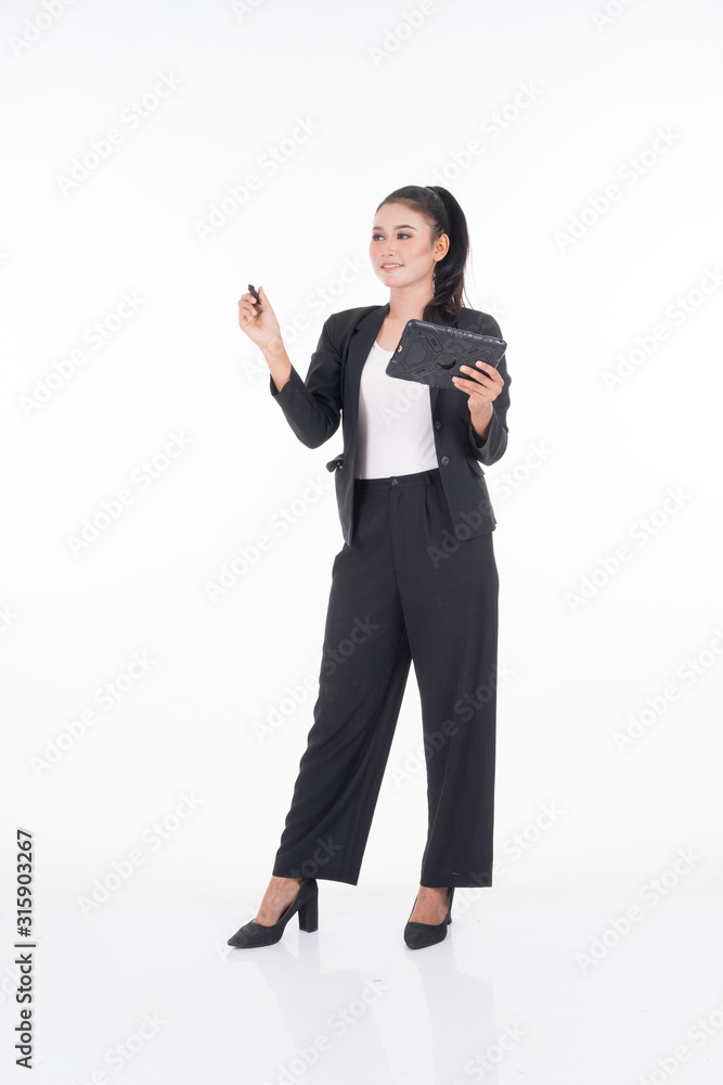An attractive woman wearing business attire holding a tablet with various poses isolated on white background. Suitable for image cut out and manipulation works for technology,business or finance theme An attractive woman wearing business attire holding a tablet with various poses isolated on white background. Suitable for image cut out and manipulation works for technology,business or finance theme