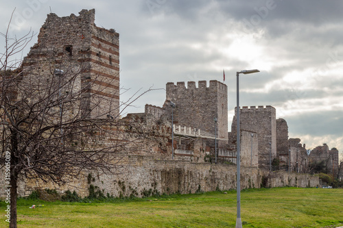 Eastern roman byzantine walls surrounding historical old Istanbul peninsula. Topkapi and Edirnekapi region. Turkey photo