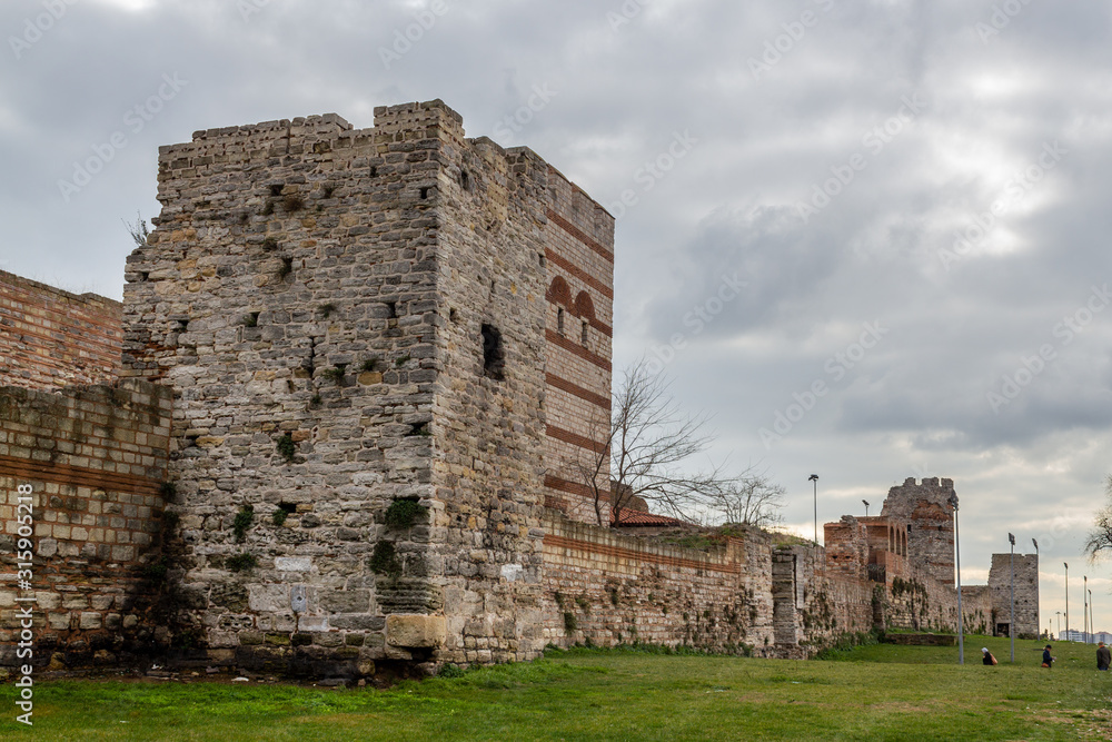 Eastern roman byzantine walls surrounding historical old Istanbul peninsula. Topkapi and Edirnekapi region. Turkey