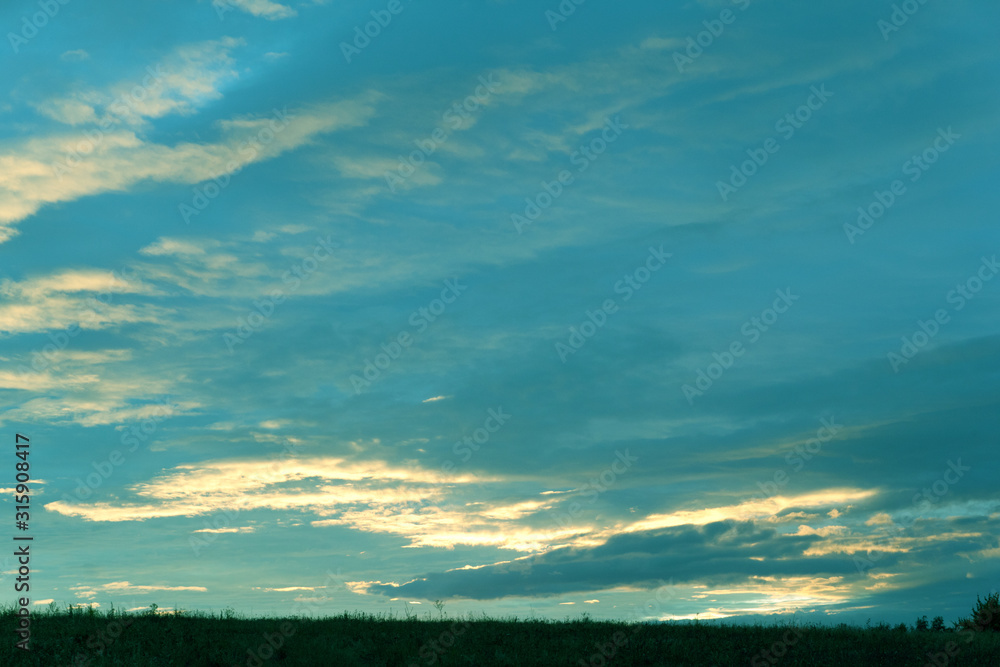 Beautiful colorful gradient sunset over field. Nature landscape sunset background Beautiful colorful gradient sunset over field. Nature landscape sunset background