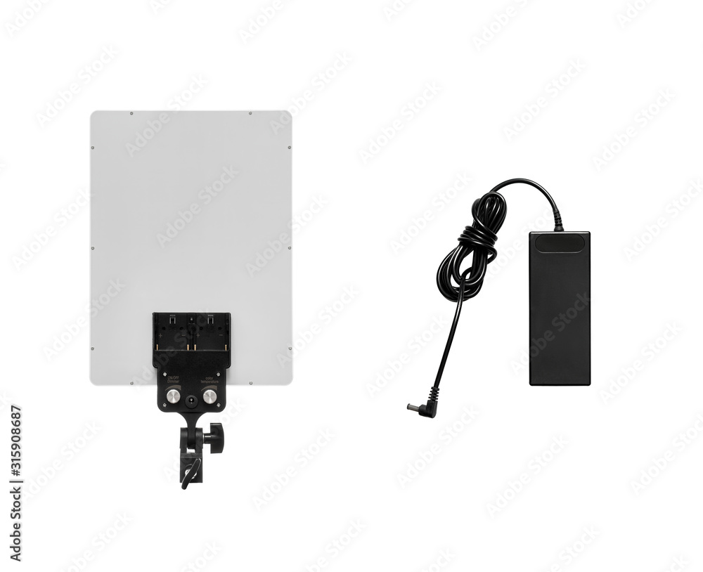 Professional lighting equipment for video production isolated on white. Portable video light for filming video and video blogging. Lighting device for film production and video filming. Professional lighting equipment for video production isolated on white. Portable video light for filming video and video blogging. Lighting device for film production and video filming.