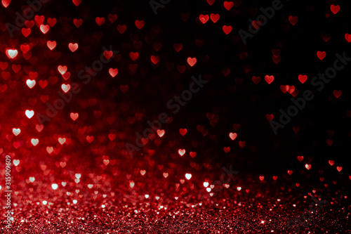 valentines day background with red hearts glitter bokeh on black, card for Valentine's day, christmas and wedding celebration, Love bokeh shiny confetti textured template