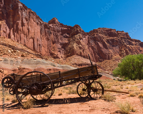 Antique farm wagon in Capitol Reef National Park west of Torrey, Utah, USA