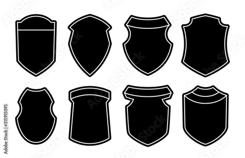 Set of blank empty dark shields. Black badge shapes. Vintage heraldic banner shapes design. Retro style borders  frames  labels