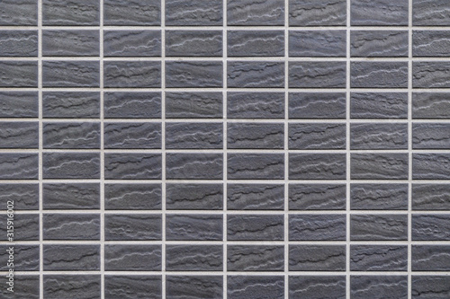 Black tile wall pattern background