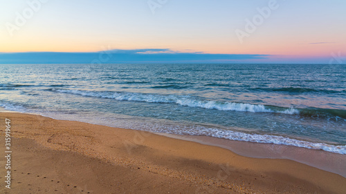 Blurred motion of waves on beach