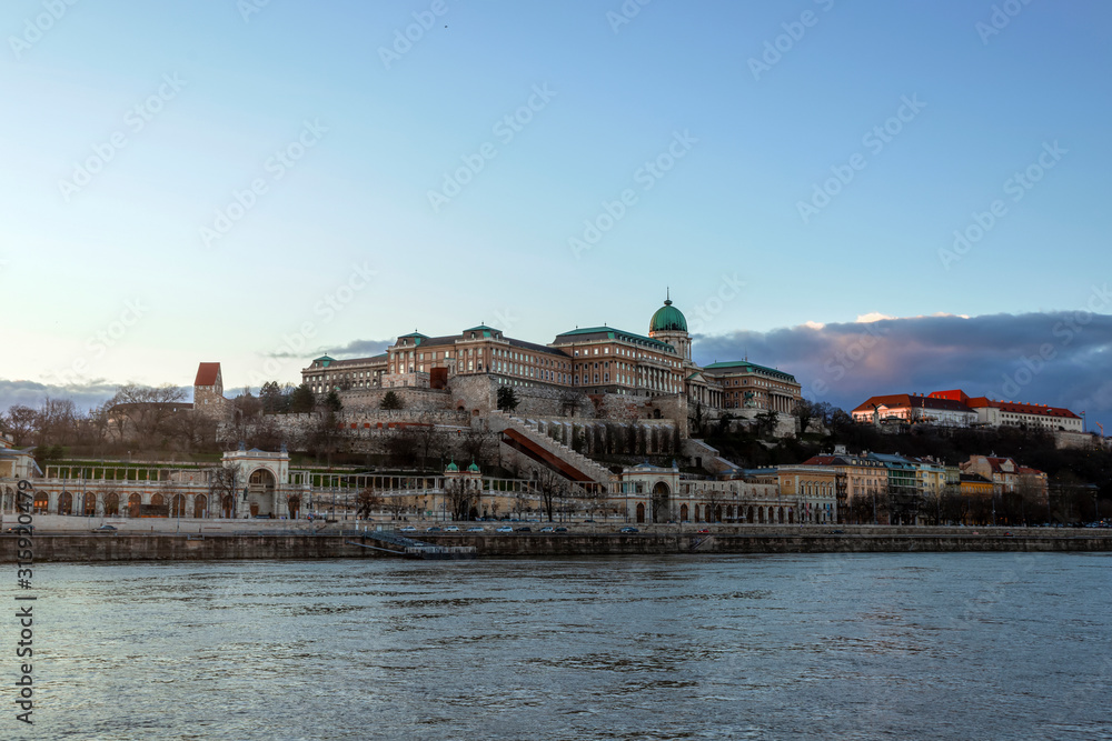 Building of the Royal Palace at sunset in Budapest on the Danube River, Hungary.