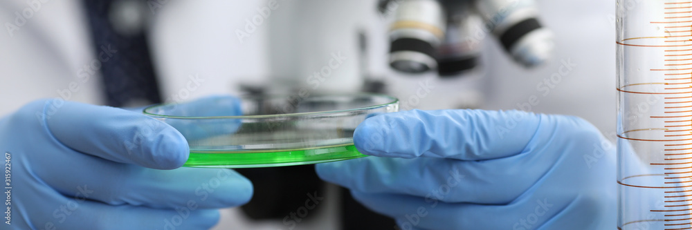 Scientist in modern lab Scientist in modern lab