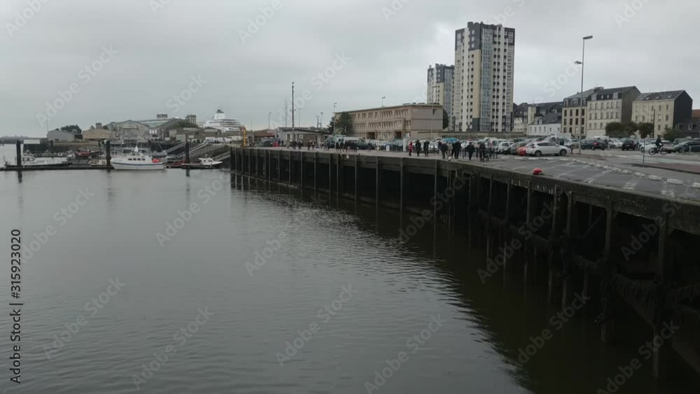 Casual view on the architecture and streets in Cherbourg near port side, France at rainy weather Casual view on the architecture and streets in Cherbourg near port side, France at rainy weather