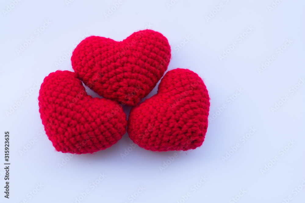 Beautiful red heart on a natural bokeh background. Valentine's Day . Beautiful red heart on a natural bokeh background. Valentine's Day .