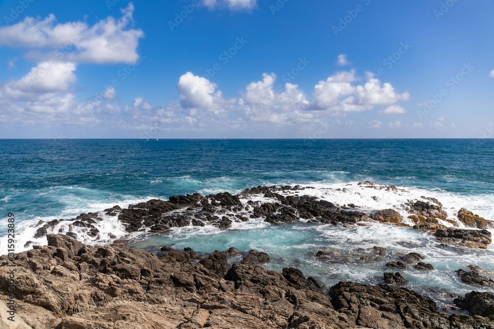 Sainte-Anne, Martinique, FWI - Waves in  the blue eye hole (oeil bleu) in Ferré Cape