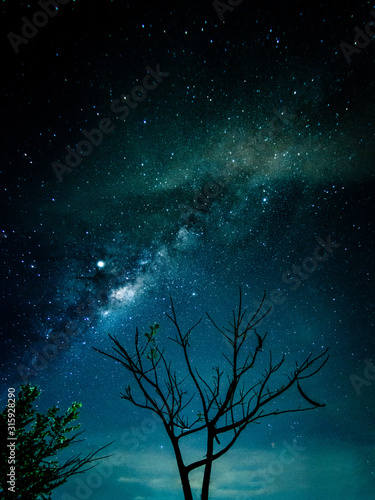 Milky way galaxy with stars and space in the universe background at thailand photo
