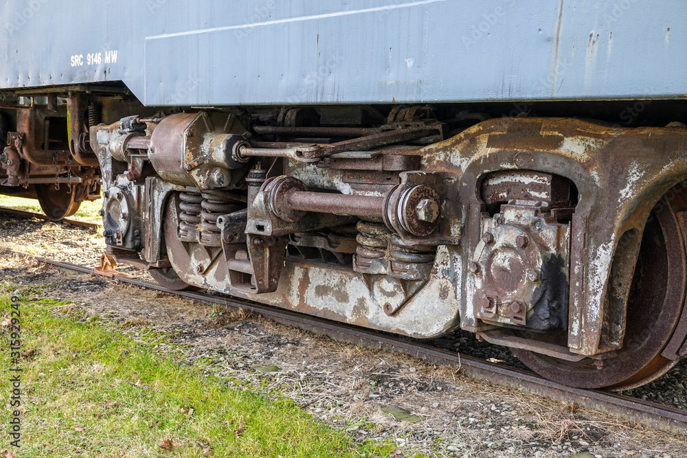 Old rusted railroad train wheel assembly