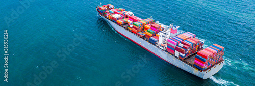 Cargo ships with full container receipts to import and export products worldwide © Photo Gallery