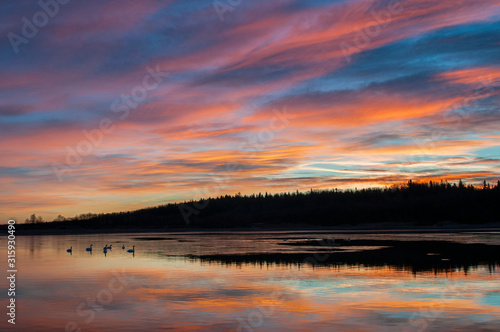 beautiful sunrise on the autumn lake